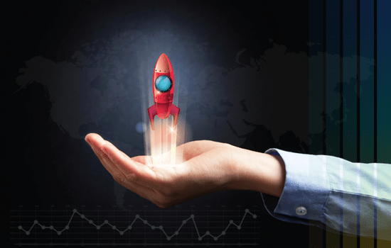 Hand holding a launching rocket representing entity setup and operational launch for growth offered by Cerity Global